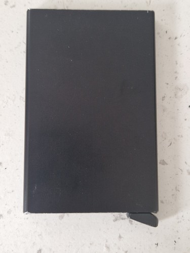 Secrid black metal push - black,